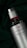 A silver spray bottle with a textured metal cap and red accent on top. The bottle is labeled 'Victorinox Swiss Army Classic' and is set against a dark green, textured fabric background, adding a sense of luxury and sophistication.