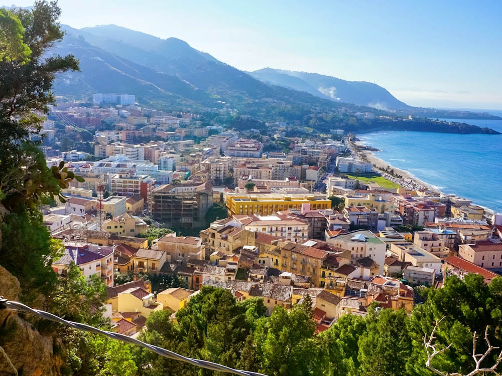 a view of a city with mountains in the background