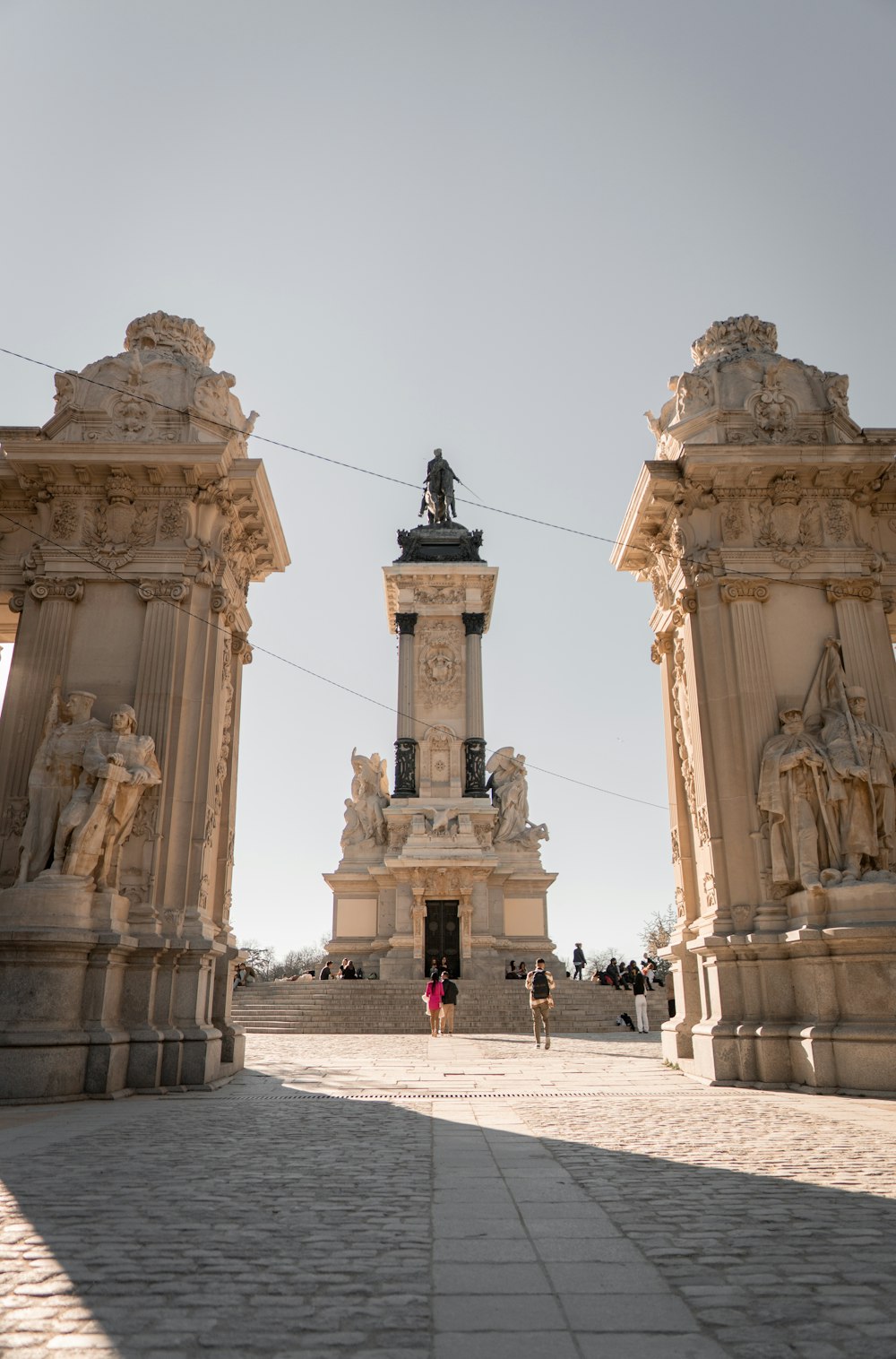 a statue of a man on top of a tower