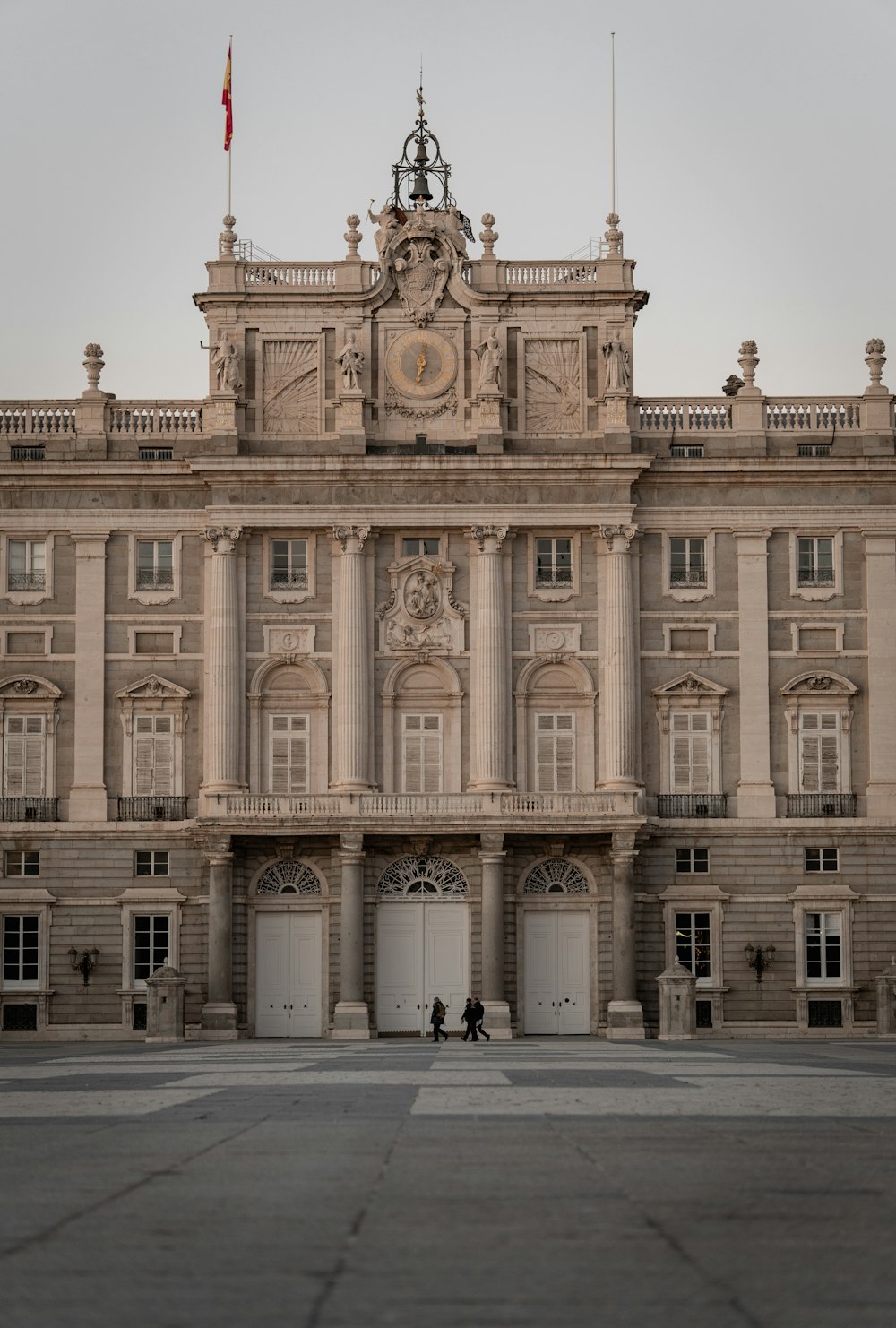 a large building with a clock on the top of it