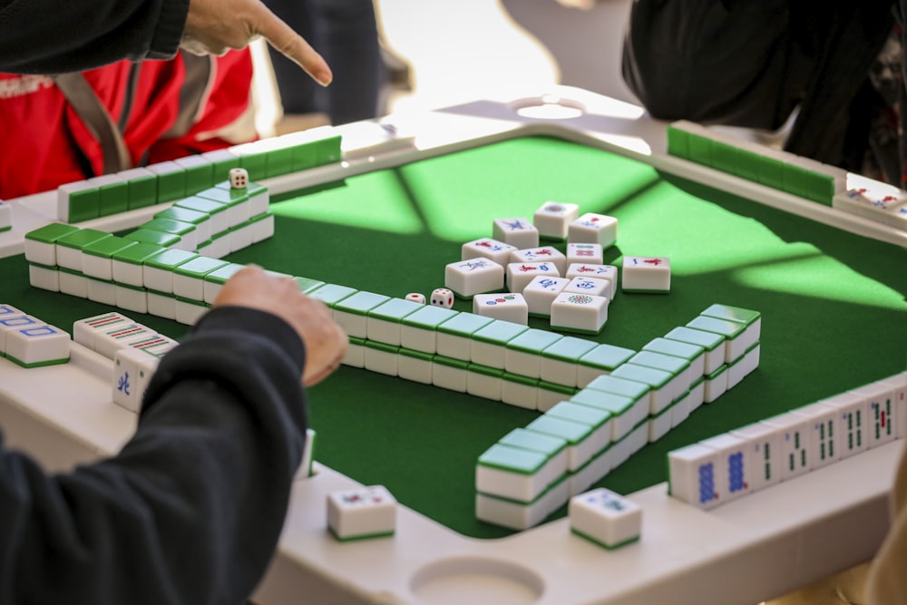 a close up of a game of dominos on a table