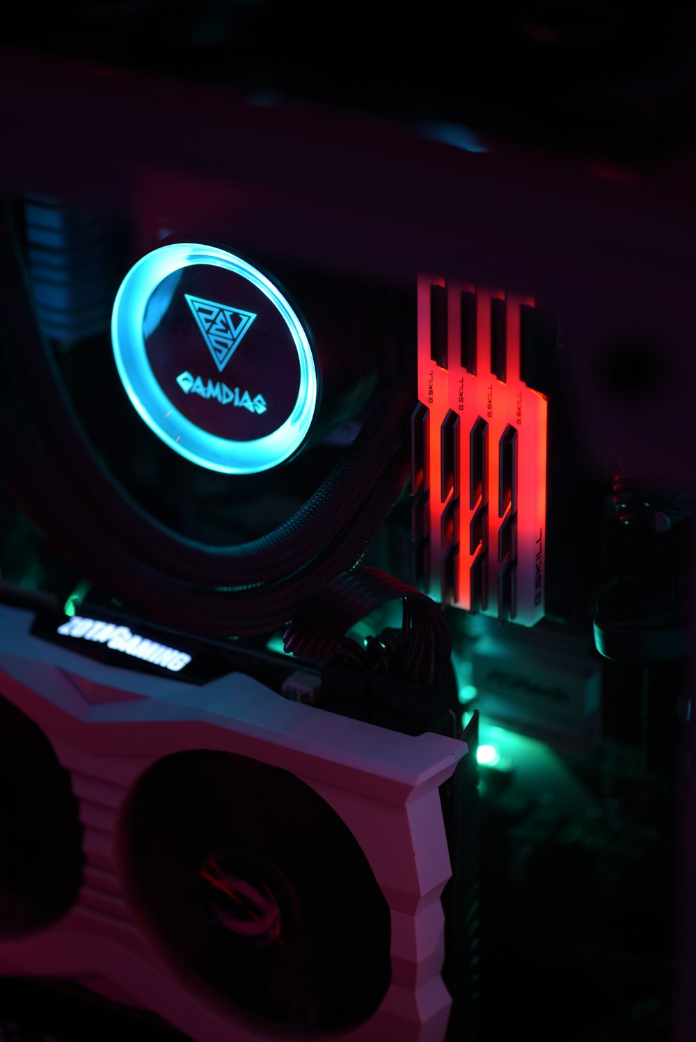 a close up of a computer with a neon sign