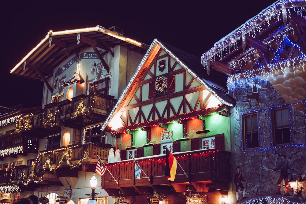 a building with christmas lights and decorations on it