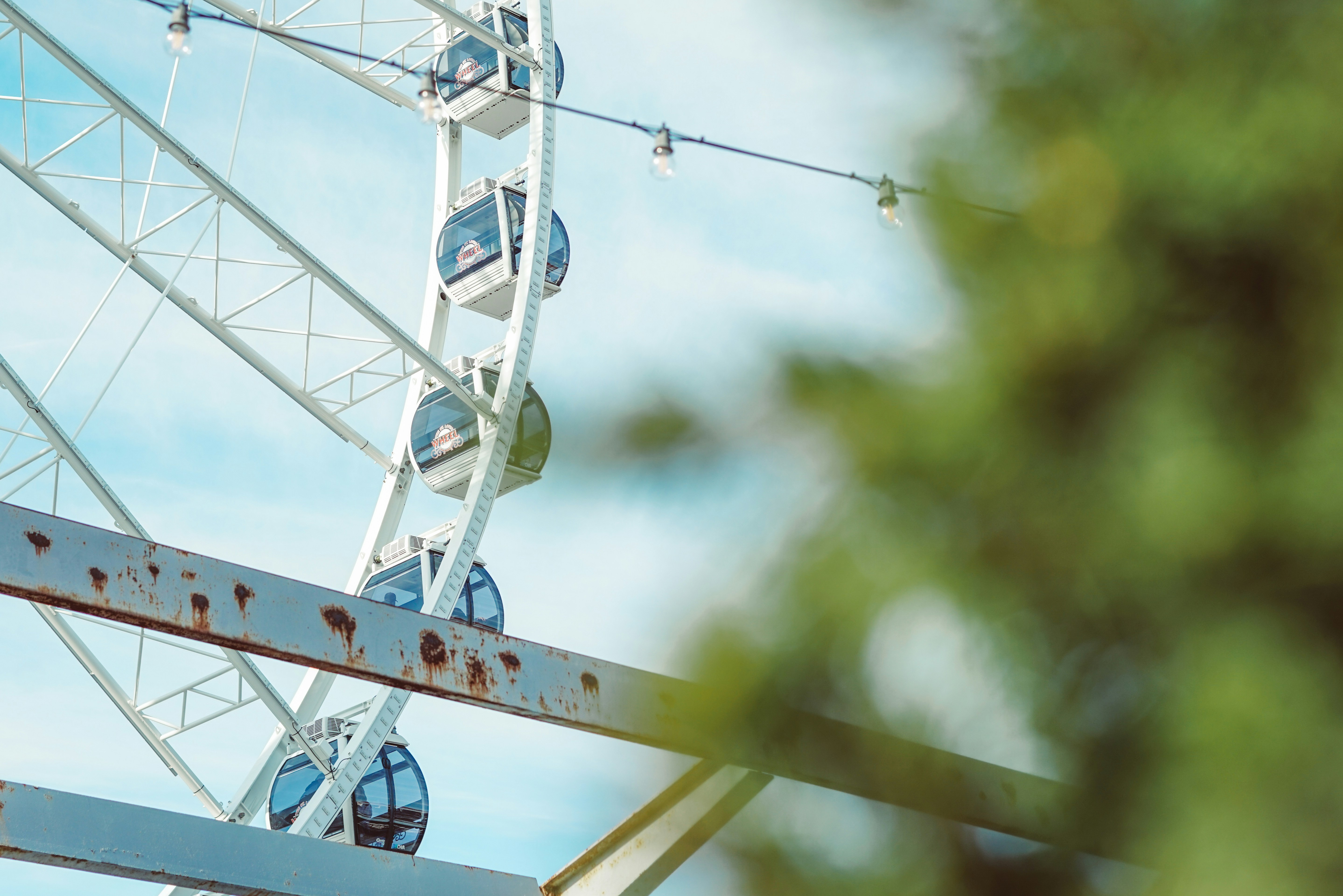 a ferris wheel with a blue sky in the background, Ferris Wheel Missouri