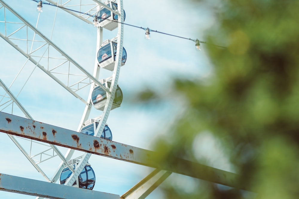 a ferris wheel with a blue sky in the background