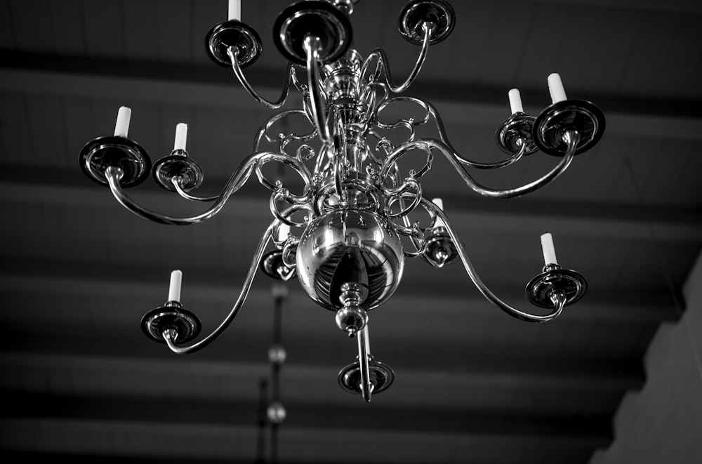 a black and white photo of a chandelier