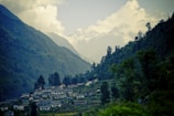 A serene view of Theog town nestled in the Himalayan foothills, symbolizing authenticity.