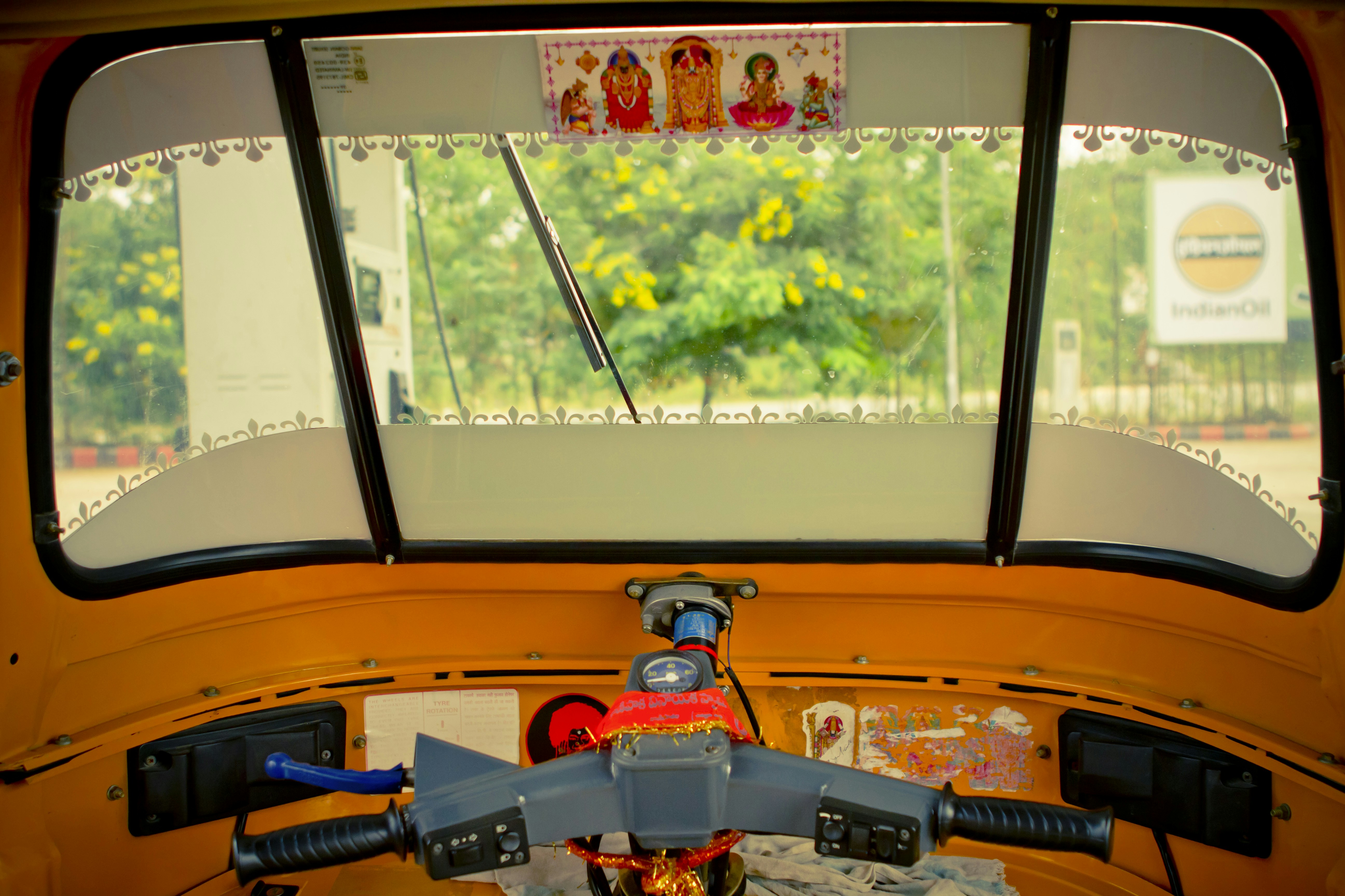 the inside of a school bus with the door open