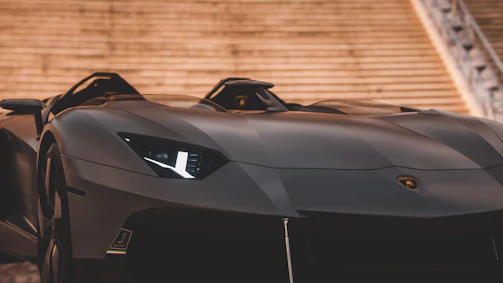 A matte finish sports coupe featuring éclatauto Satin film against a minimalist garage backdrop.