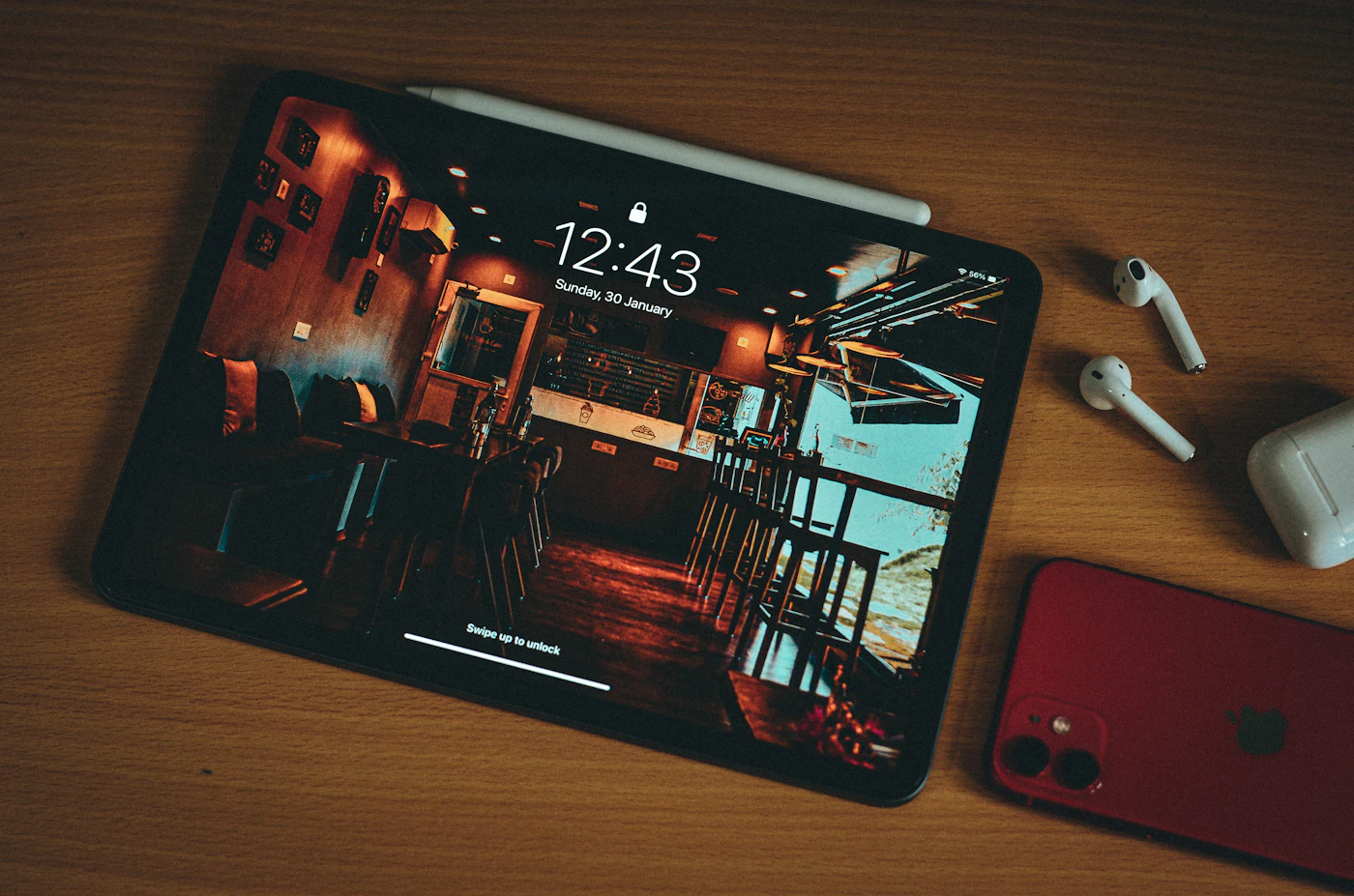 An iPad with Apple Pencil on a desk