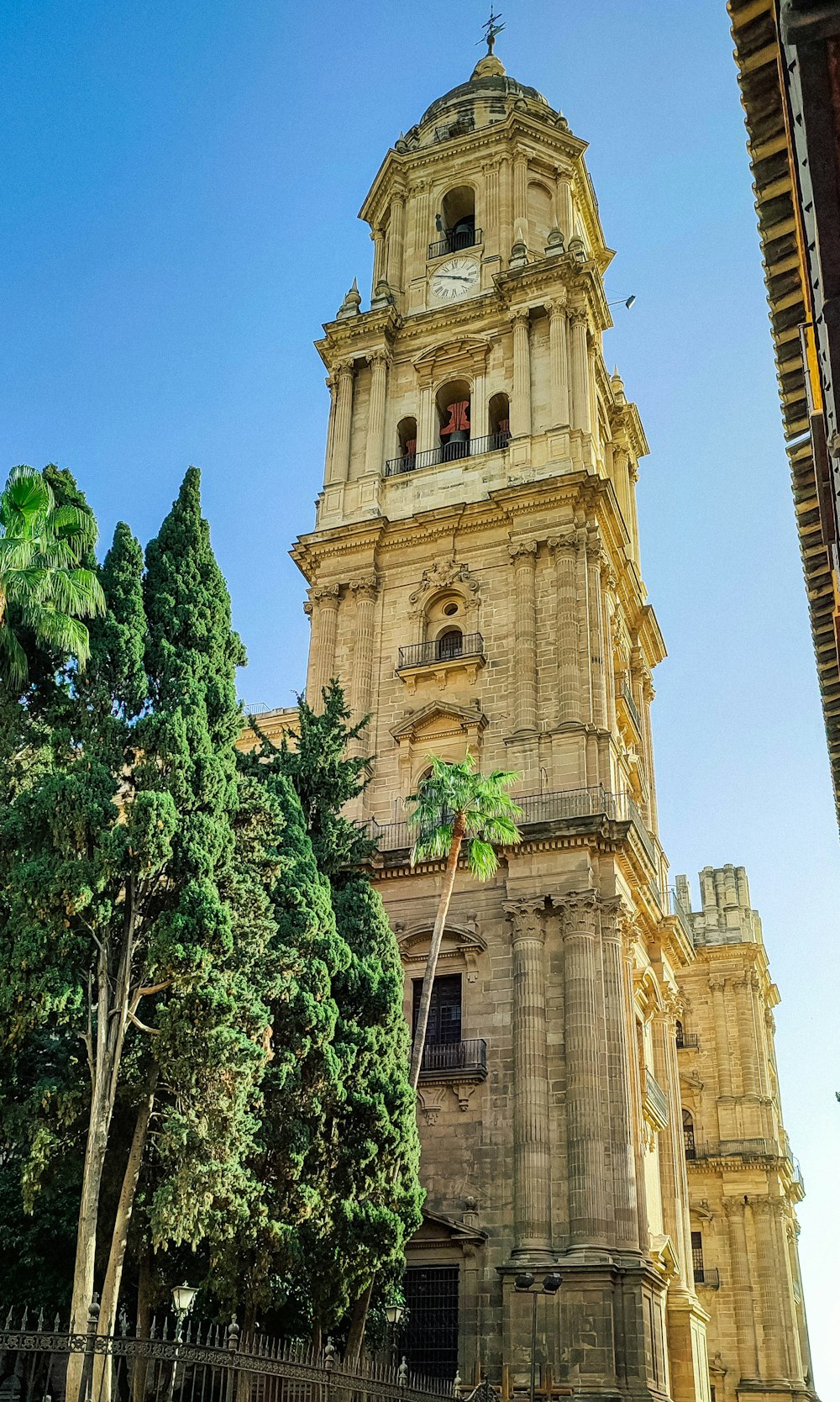 a tall tower with a clock on the top of it