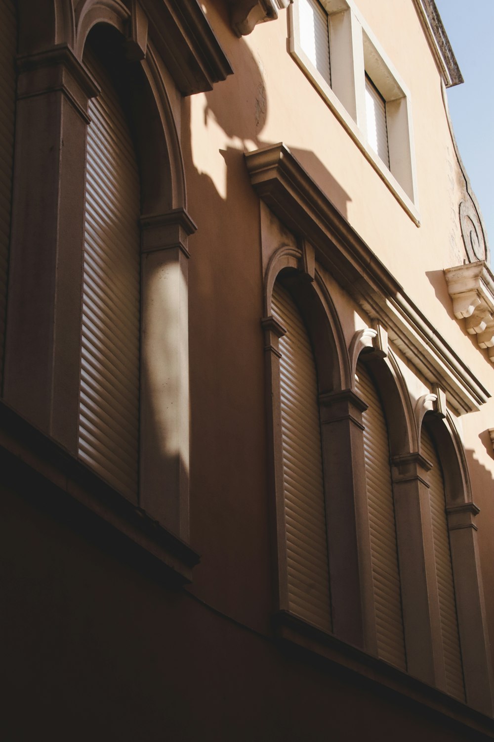 a building with a clock on the side of it