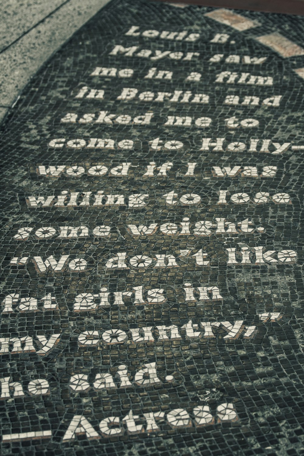 a memorial with a poem written on it