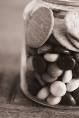 Artisan sweet jars with layered ingredients, capturing the warmth of homemade goodness.