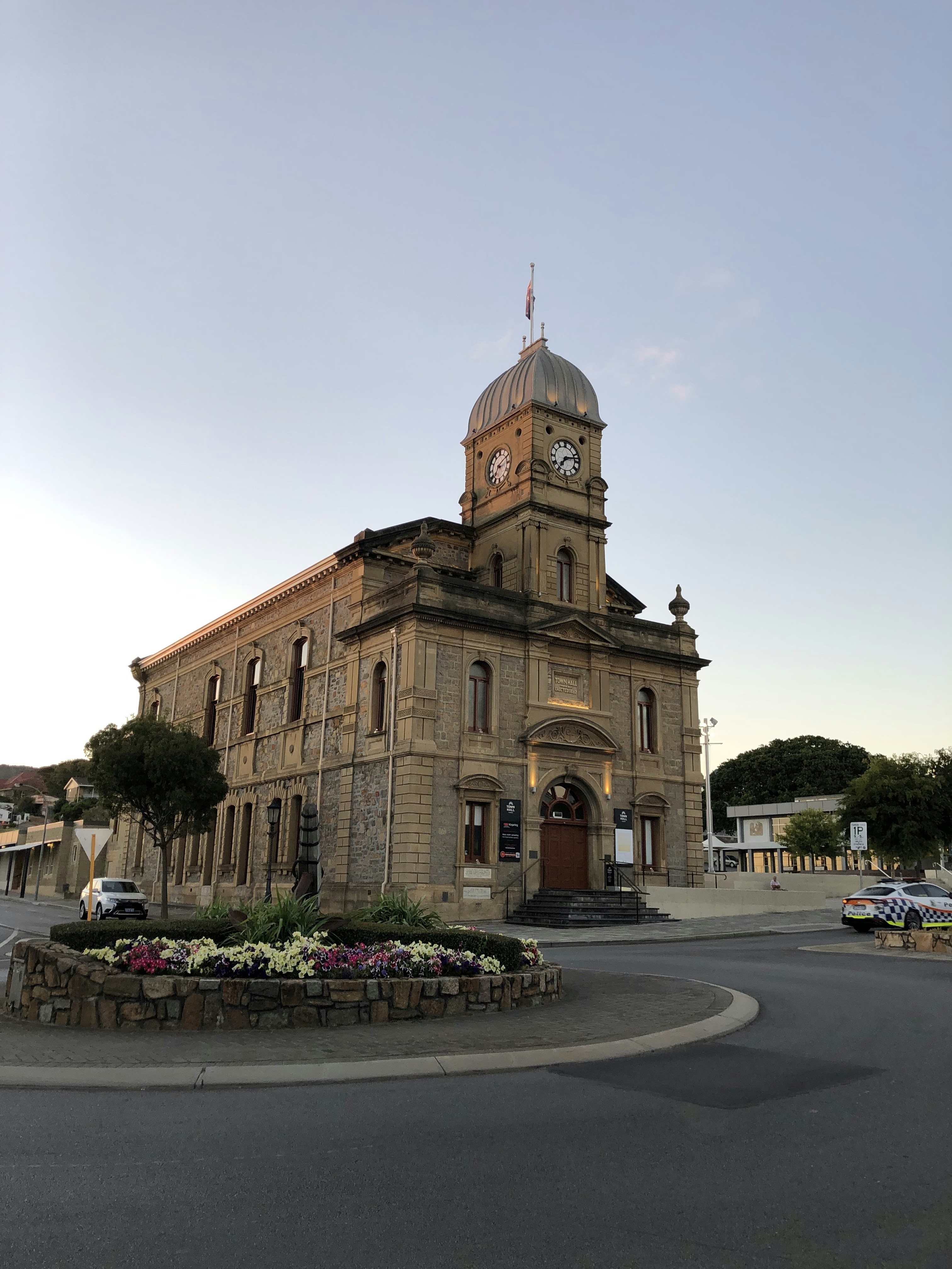 a large building with a clock on the top of it