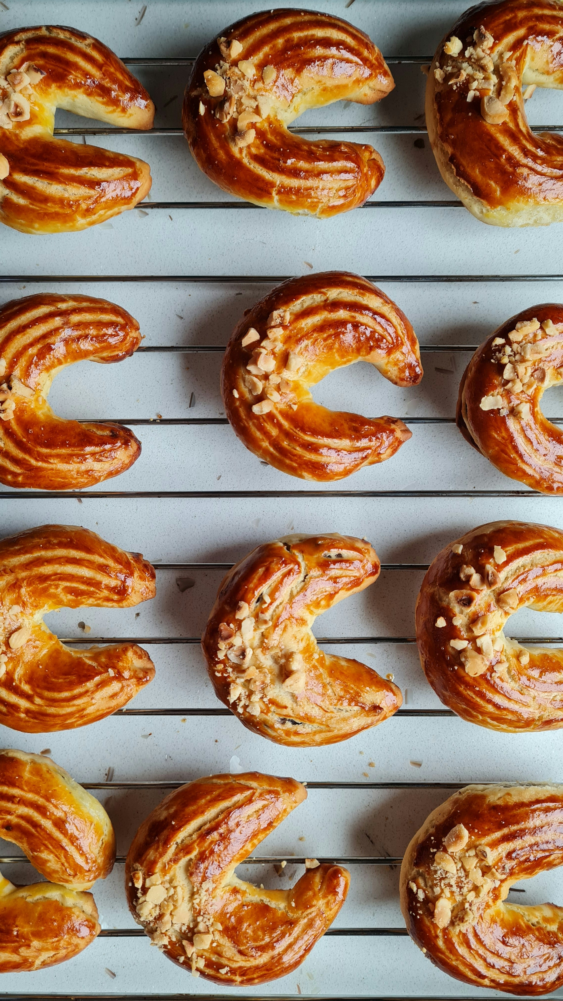 a bunch of doughnuts that are on a rack