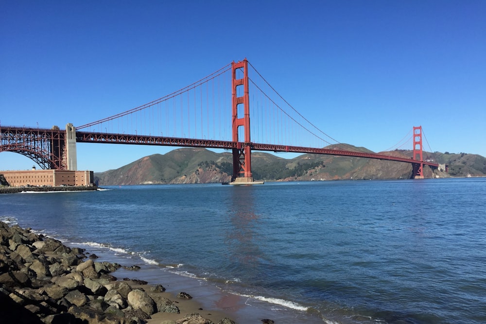 a view of the golden gate bridge from the shore