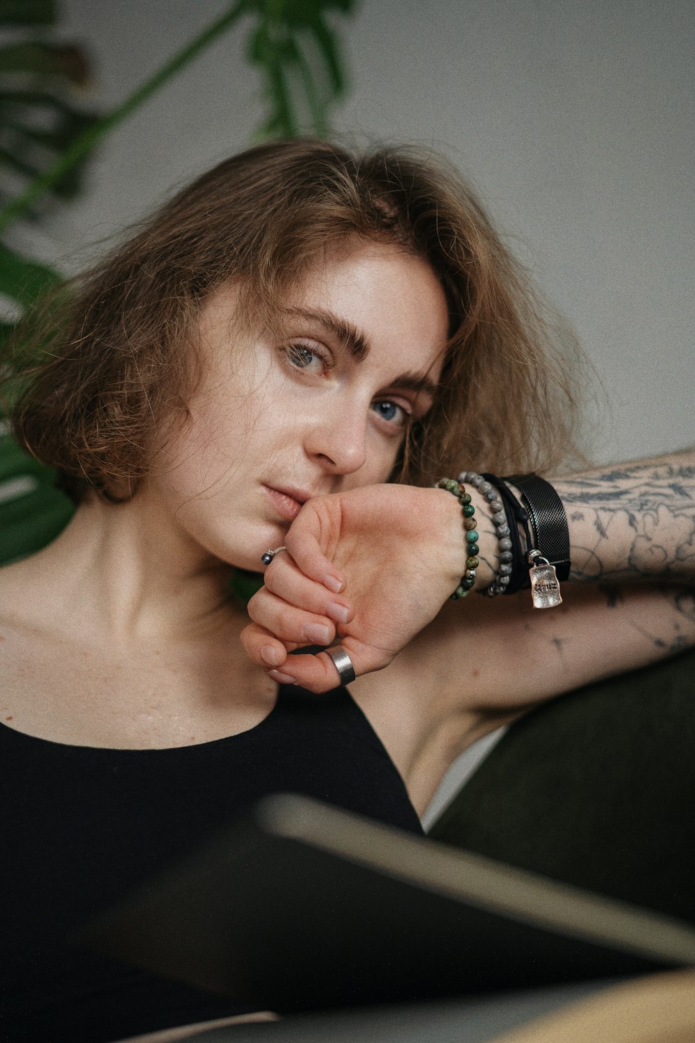 a woman with a tattoo on her arm