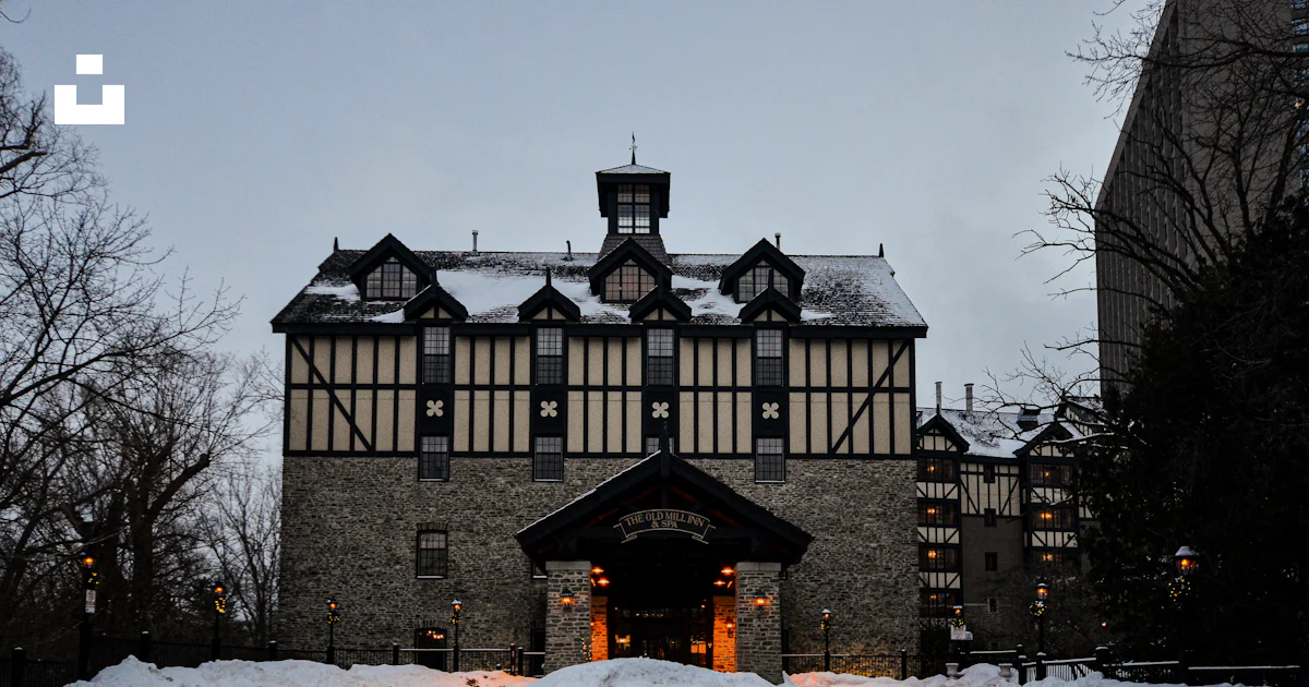 Snow Building A large building with a lot of snow on the ground photo โ Free Old mill ...