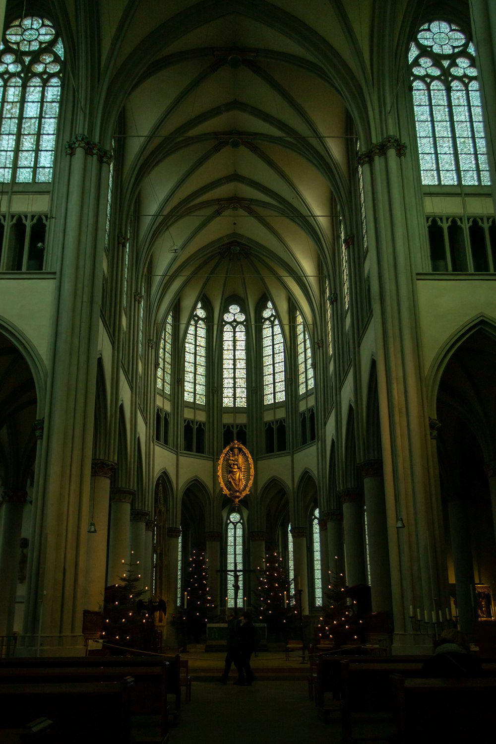 a large cathedral with a clock on the wall