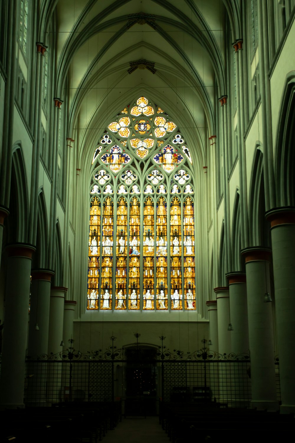 a cathedral with a large stained glass window