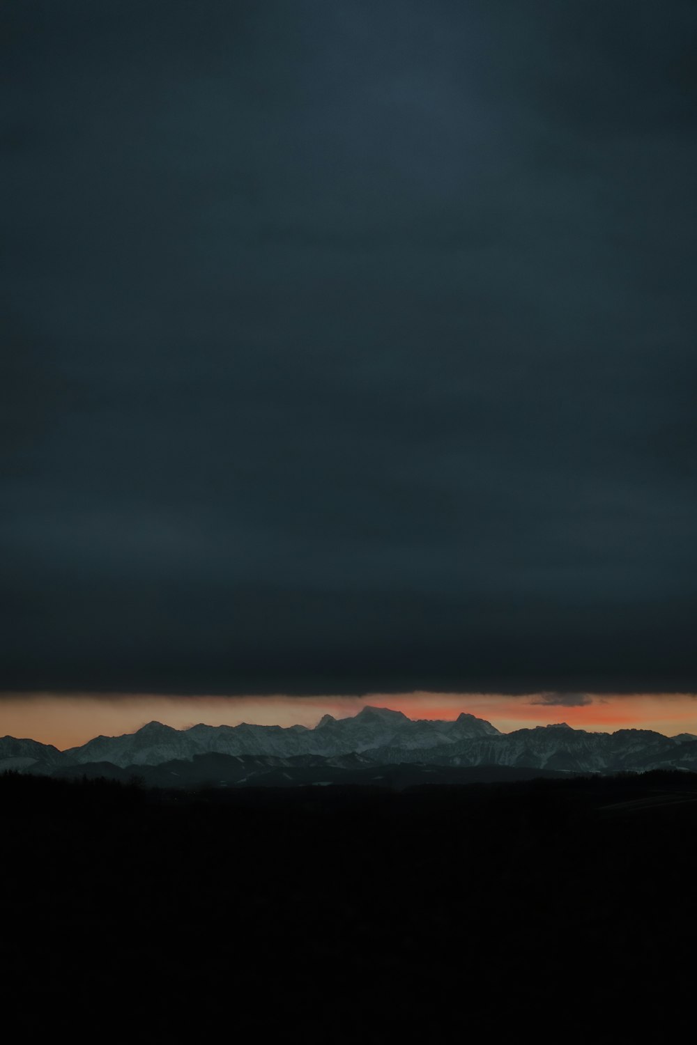 a close up of clouds in the dark