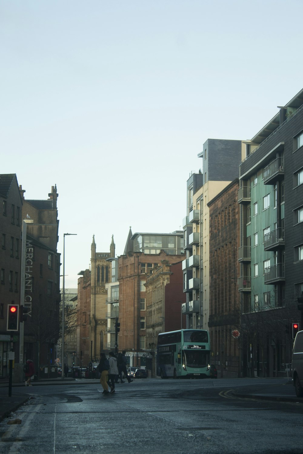 a city street filled with lots of tall buildings