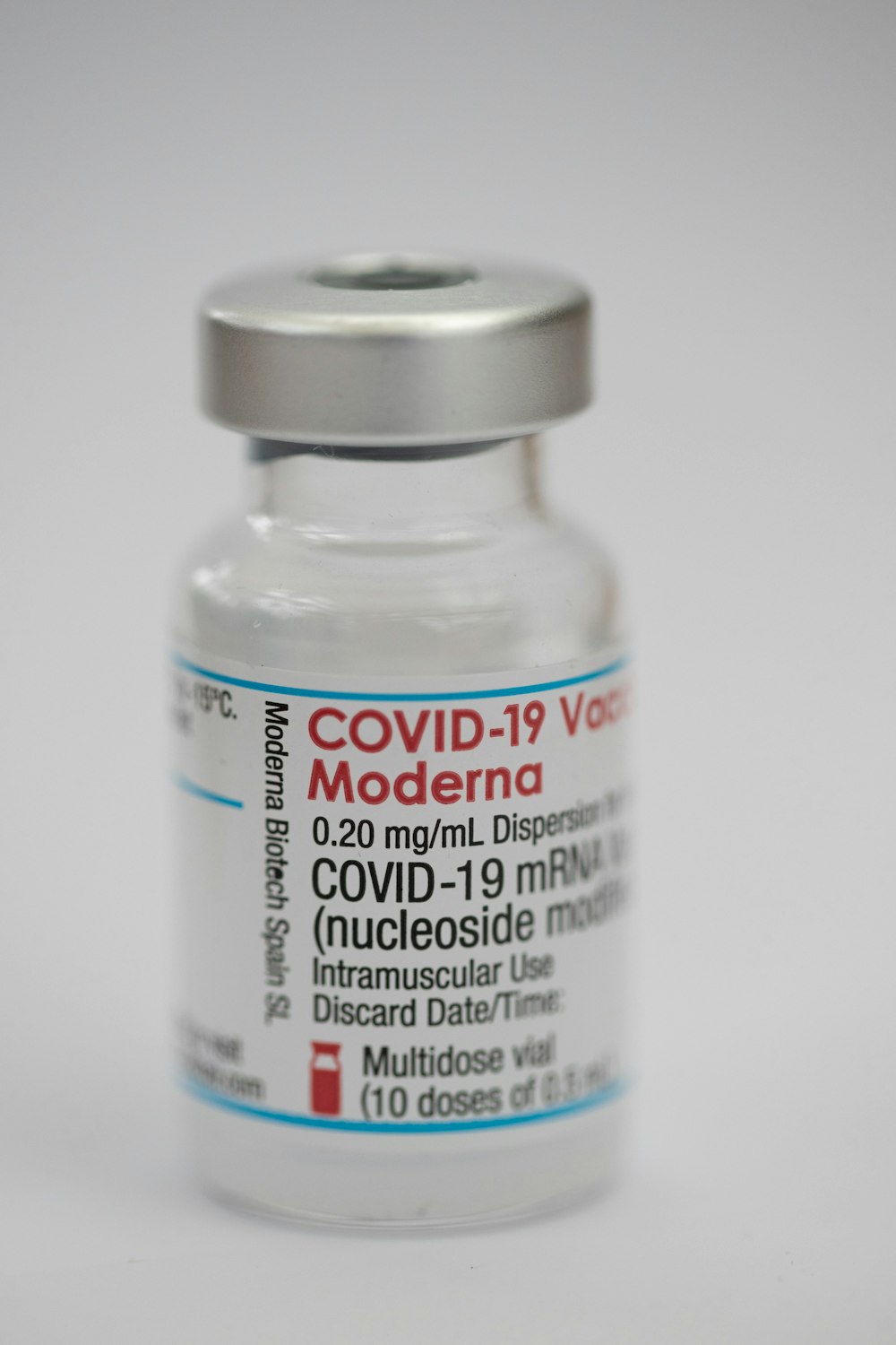 a close up of a bottle of covidd
