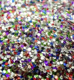 A vibrant collection of colorful beads and sequins ready for intricate embroidery.