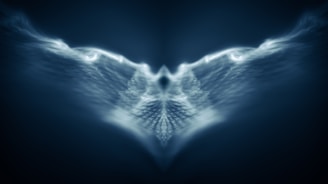 an abstract image of a blue bird with wings