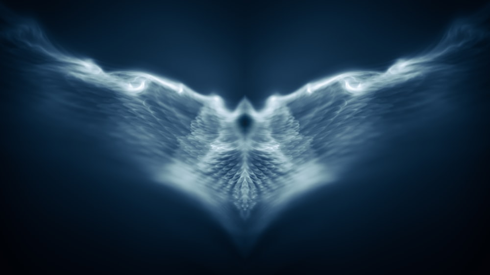 Ein abstraktes Bild eines blauen Vogels mit Flügeln