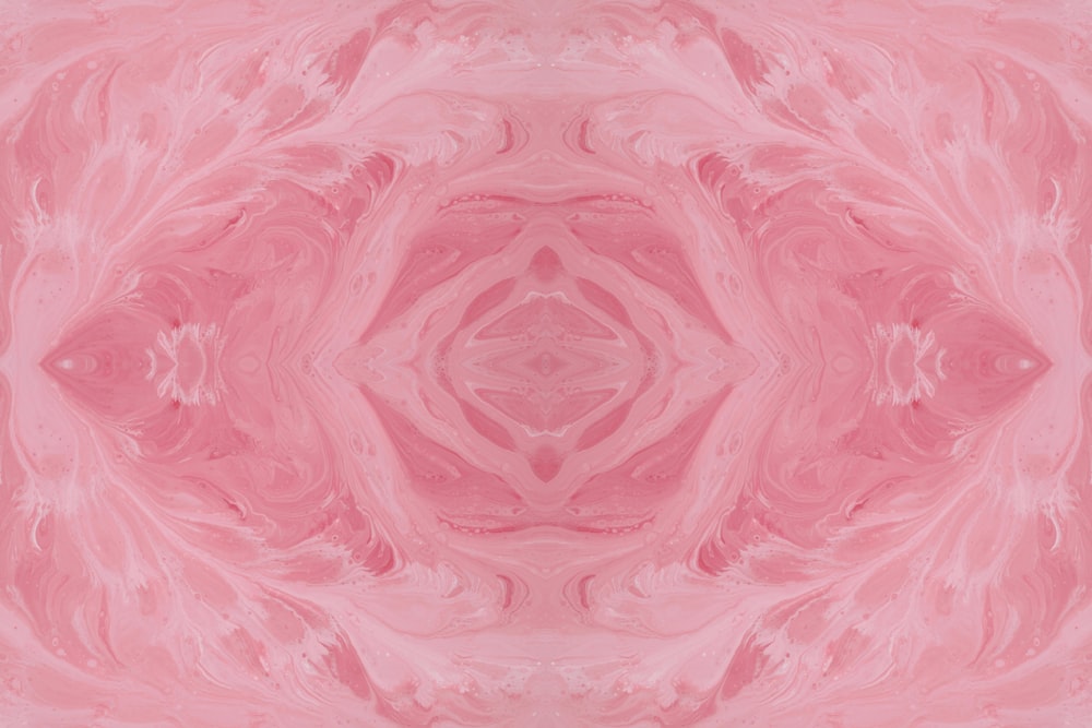 an abstract pink background with a circular design