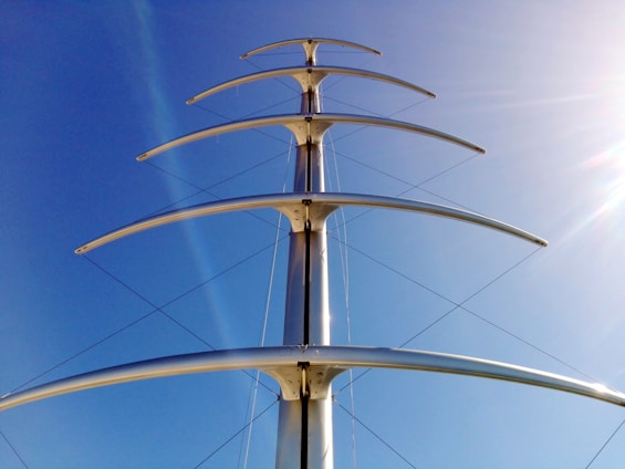 a tall metal structure with a sky background