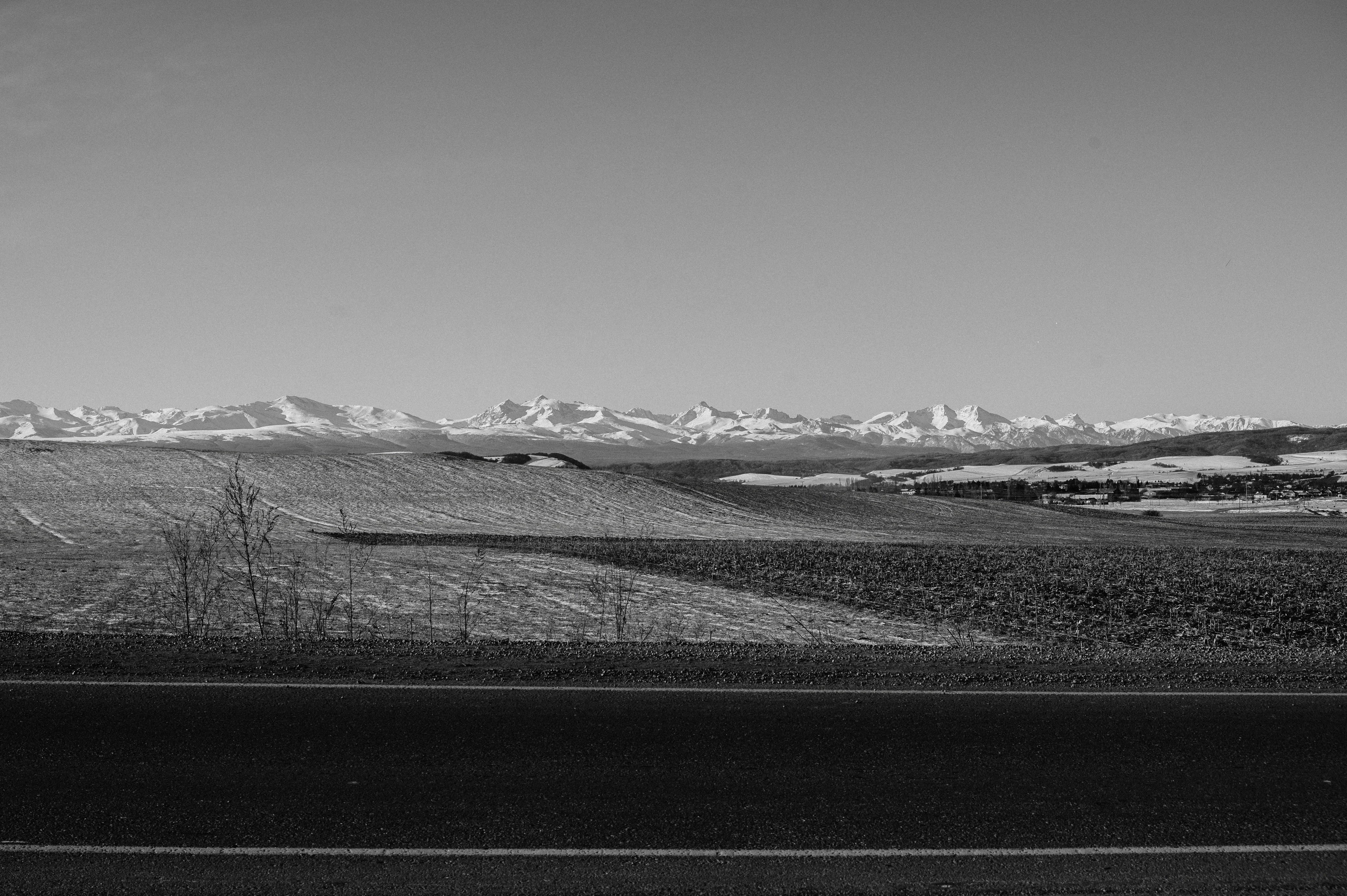 a black and white photo of a mountain range
