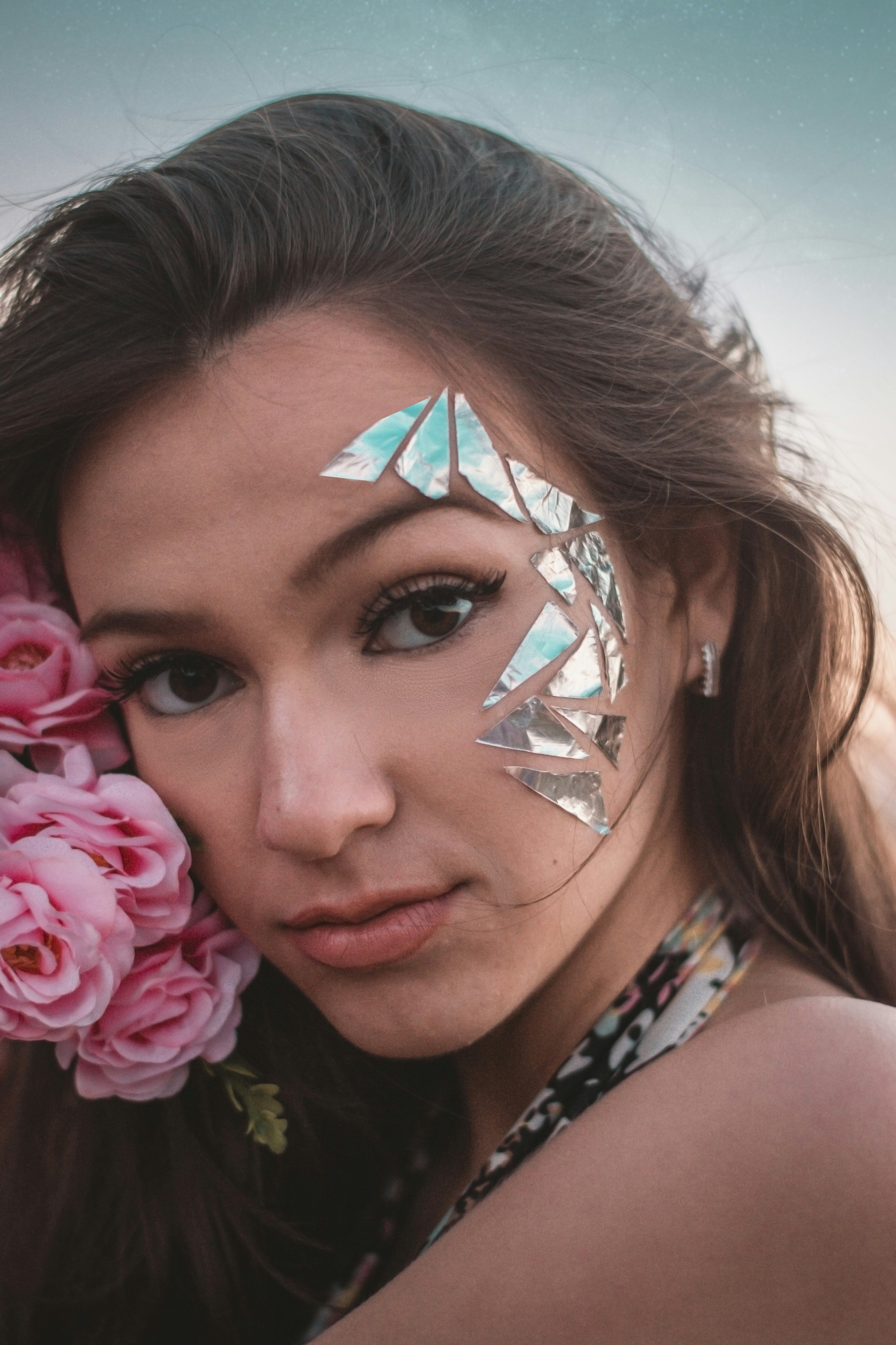 A woman with a flower in her hair photo – Free Face Image on Unsplash