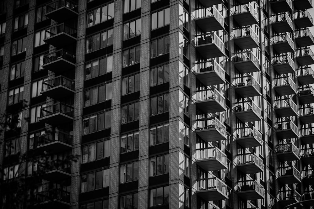 a black and white photo of a tall building