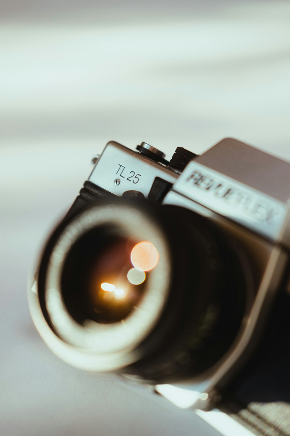 a close up of a camera with a lens