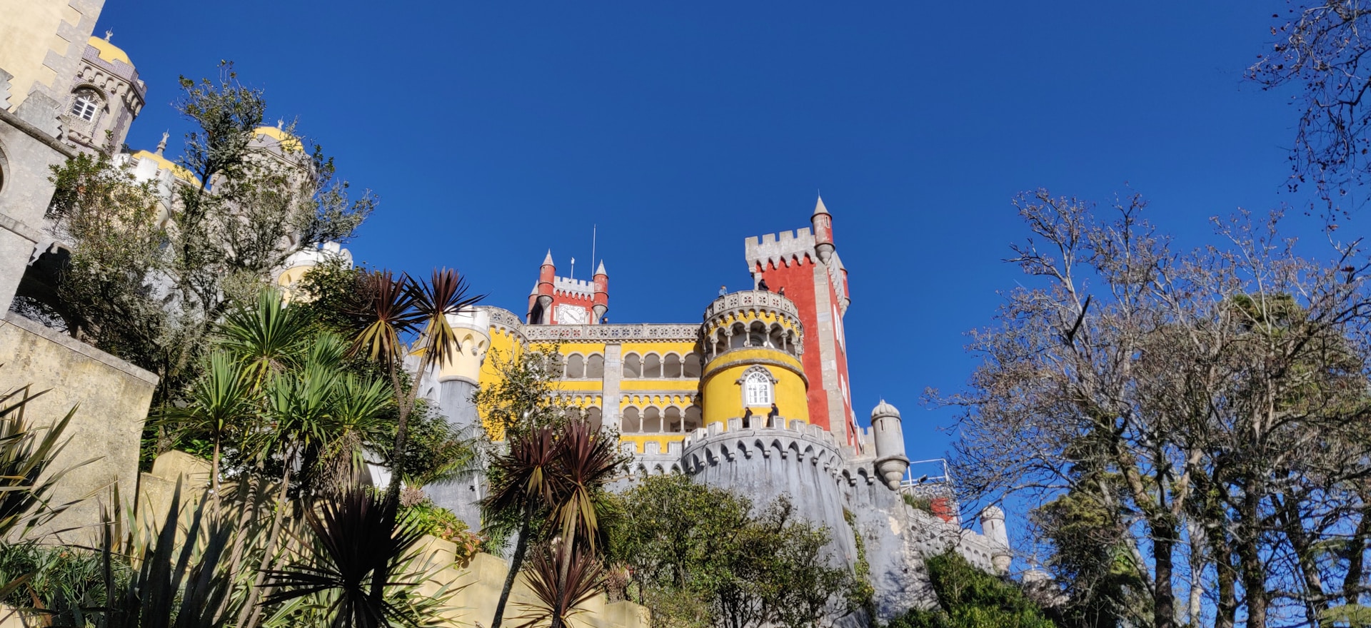 a castle with a clock on the side of it