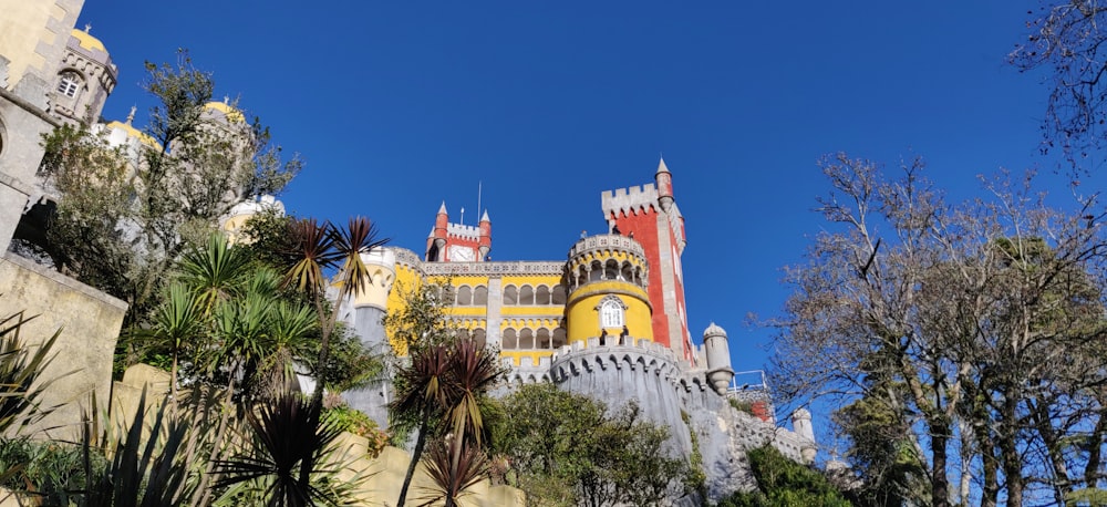 a castle with a clock on the side of it