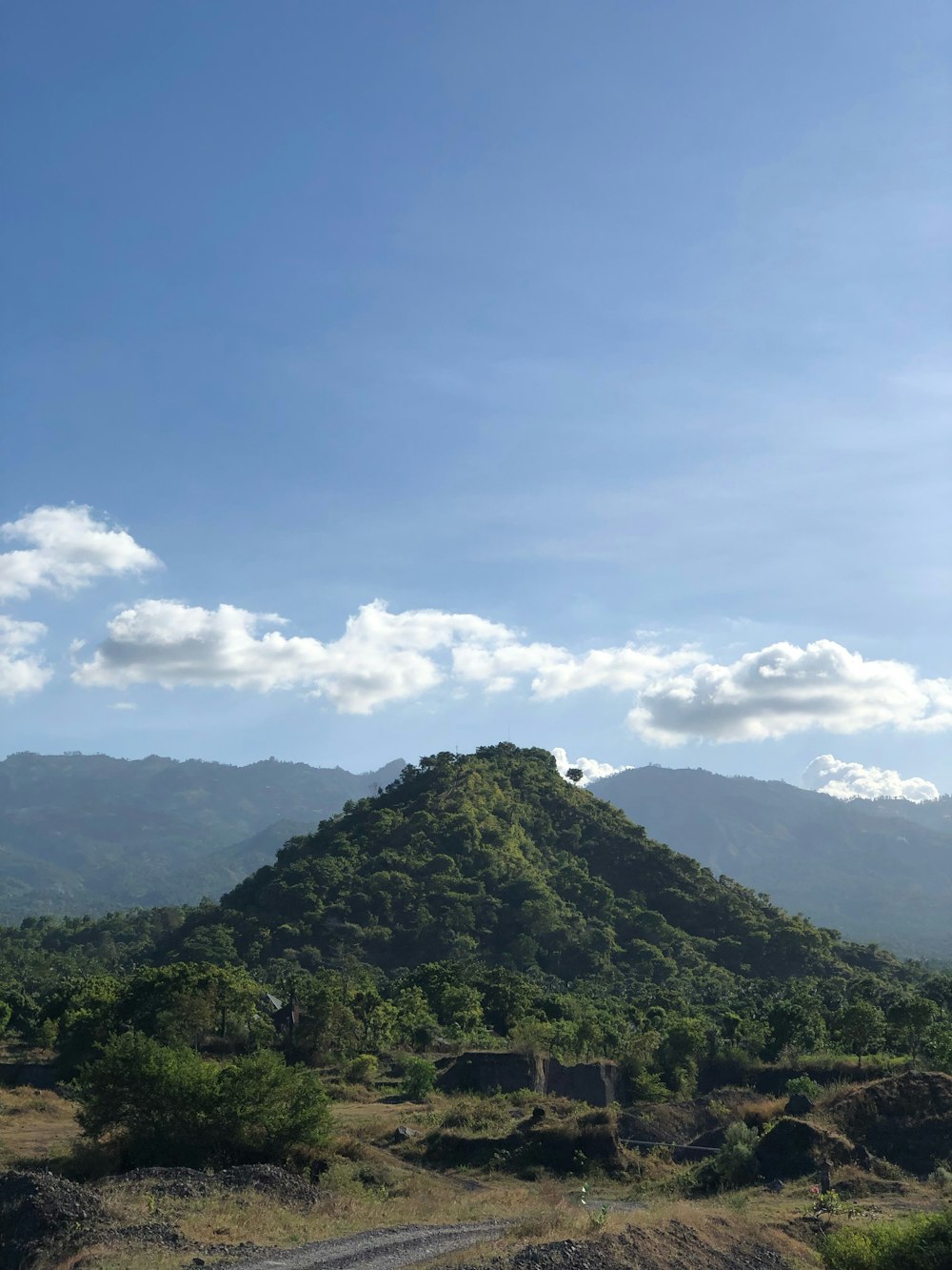 a mountain with a road going through it