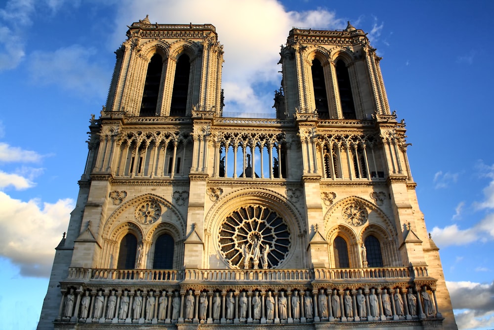 a large cathedral with a clock on the front of it