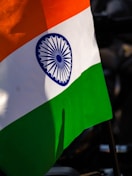 a close up of the indian flag on a motorcycle