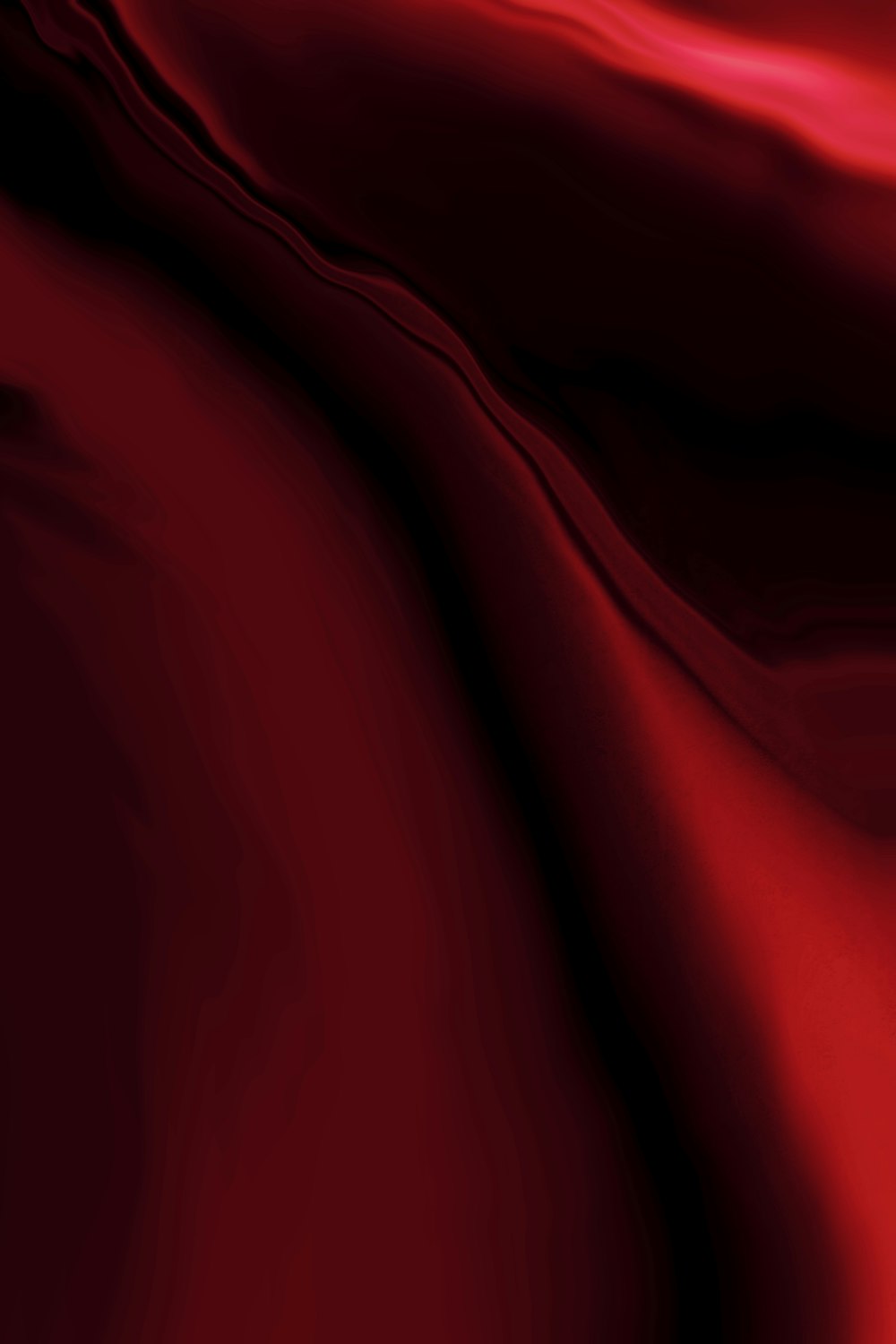 a close up of a red satin material