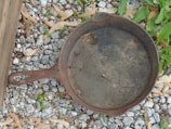 Close-up of a seasoned cast iron pan with a rich, dark patina.