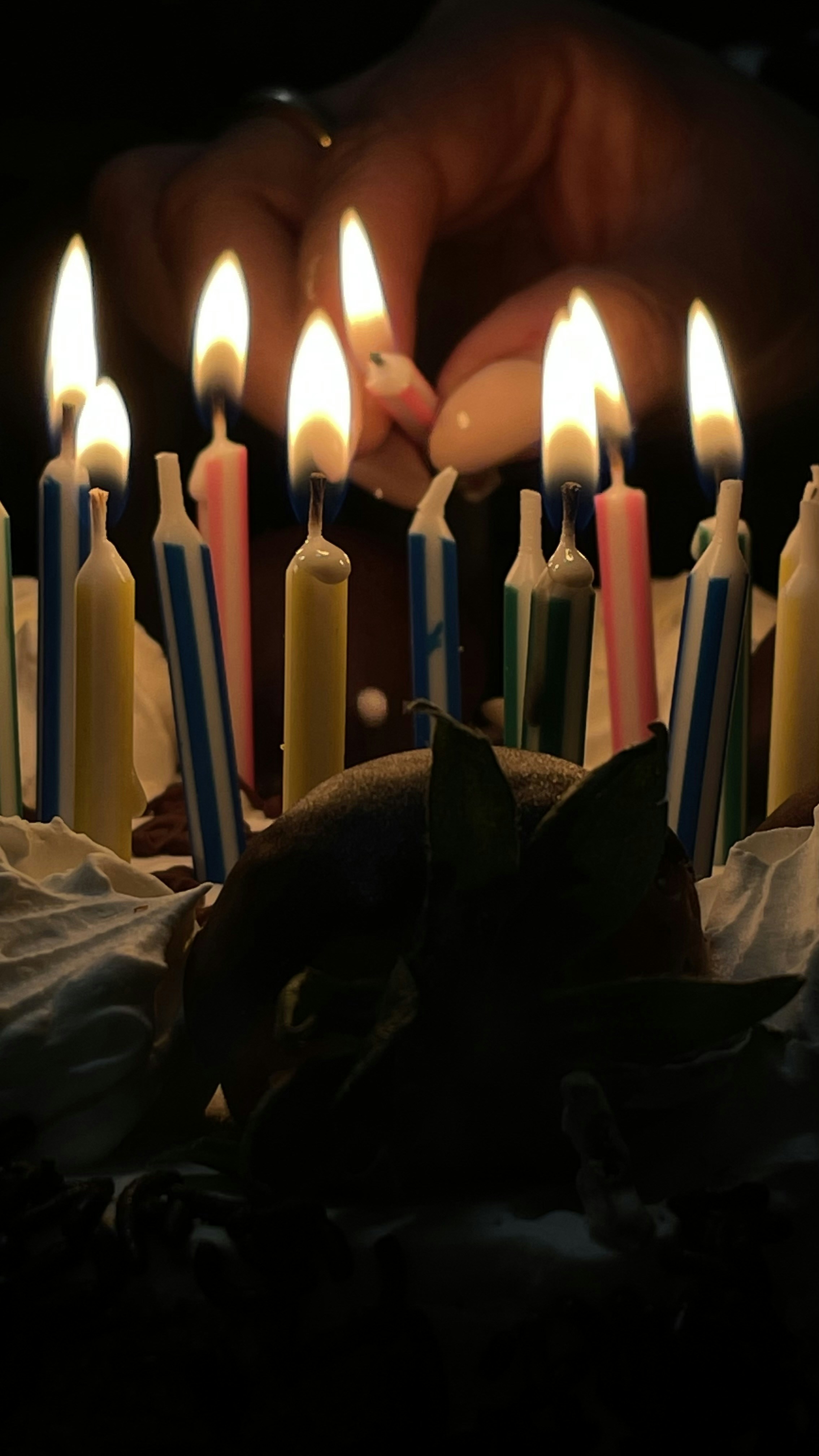 A birthday cake with lit candles on it photo – Free Candle Image on ...