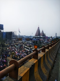 A vibrant street scene in India with various vehicles honking their horns.