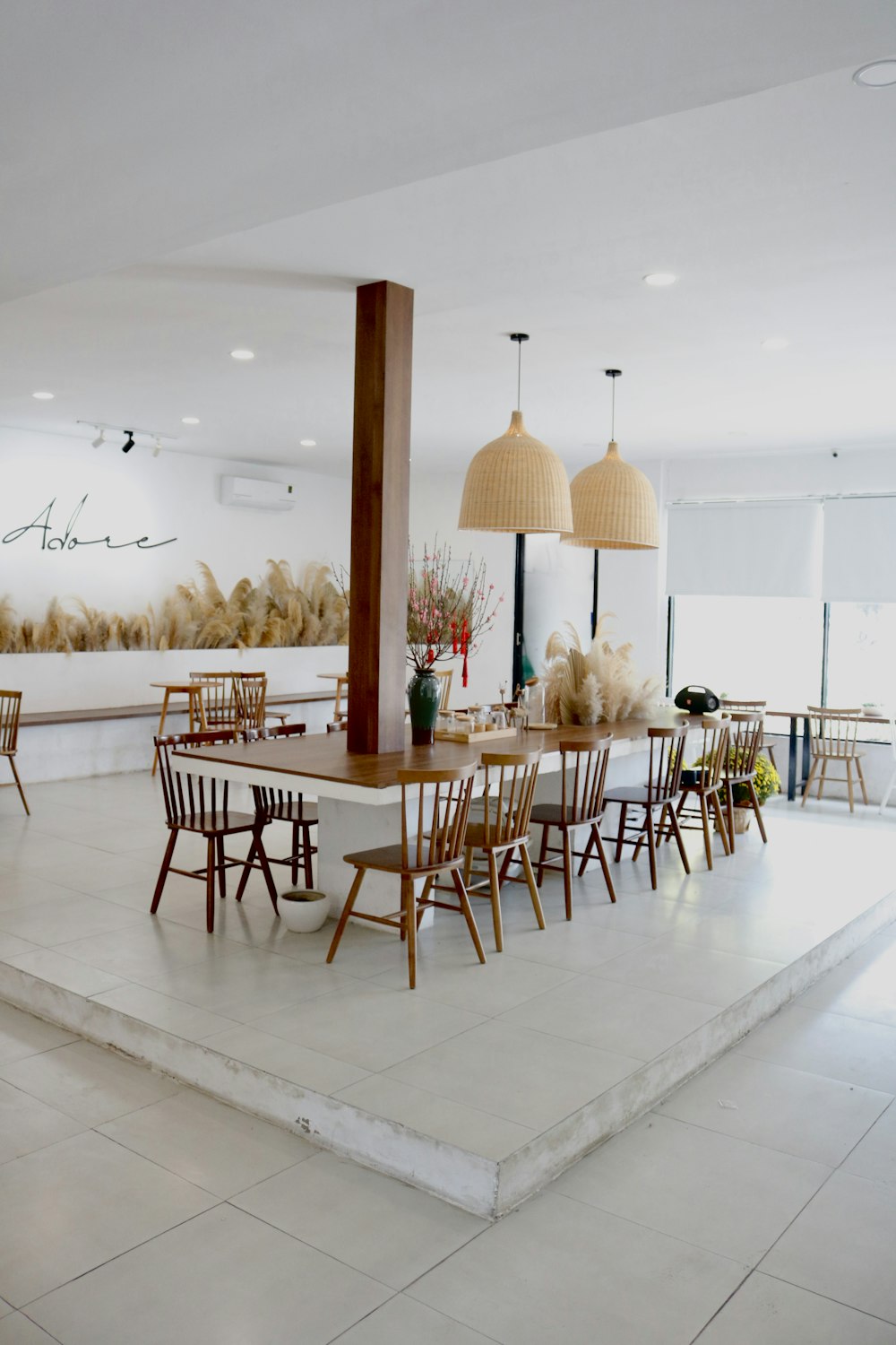 a dining room with a table and chairs