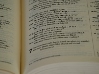 a close up of an open book with words on it