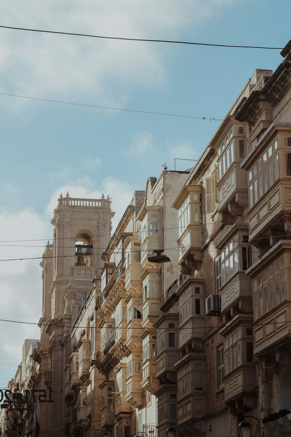 a row of buildings on a city street