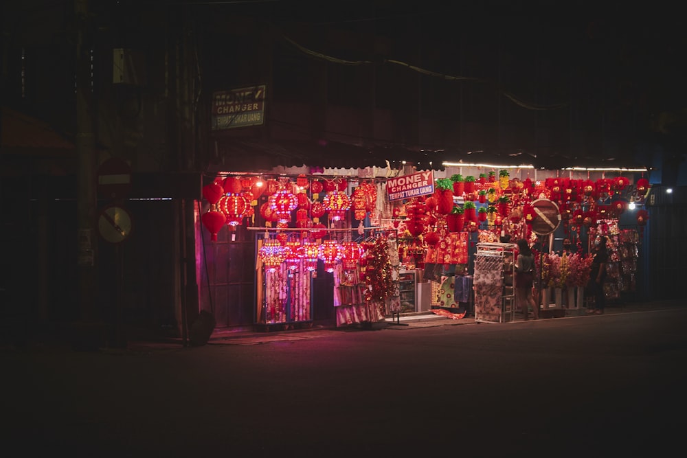 a store with a lot of red and green lights